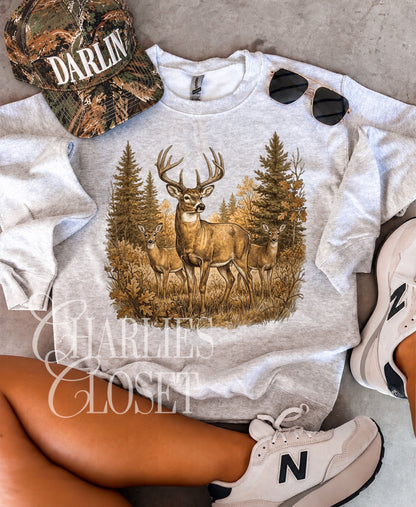 Fall deer in the trees
